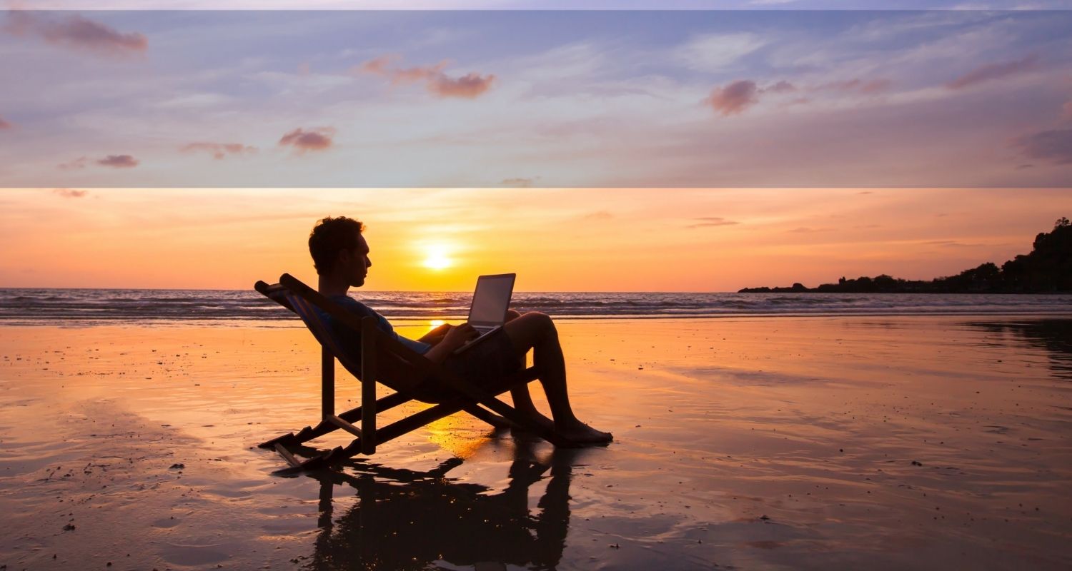 Freedom Seminar: Image depicting business man on a beach holding a laptop